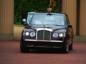 Say it isn't Prince Charles! - Rolling out of Buckingham Palace